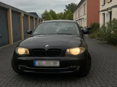 Gebraucht BMW 116 122 PS (89 kW) 2008 Schwarz Kleinwagen