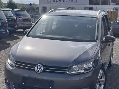 Gebraucht VW Touran Style 105 PS (77 kW) 2012 Pepper grey metallic Van / Kleinbus