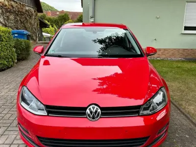 Używany VW Golf VII Edition 150 KM (110 kW) 2015 Czerwony Sedan/Limuzyna