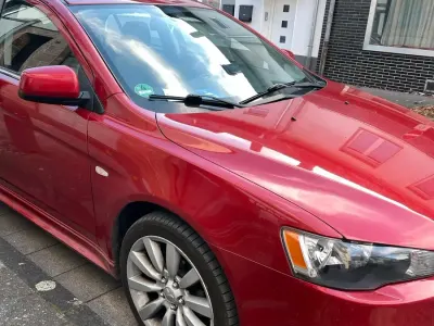 Occasion Mitsubishi Lancer Top 143 PK (105 kW) 2009 Rood Sedan