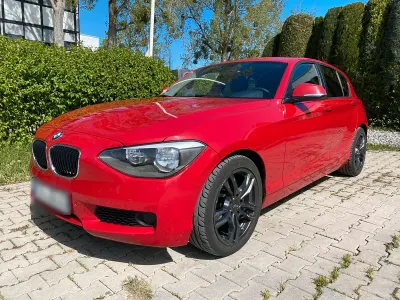 Second-hand BMW 116 116 CP (85 kW) 2012 Roșu Hatchback