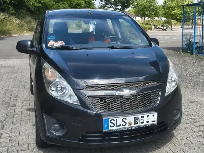 Gebraucht Chevrolet Spark 68 PS (50 kW) 2012 Schwarz Kleinwagen