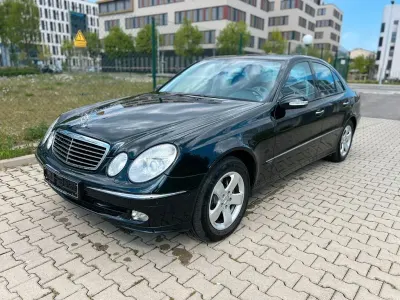 Second-hand Mercedes E200 Avantgarde 163 CP (119 kW) 2002 Negru Berlinǎ