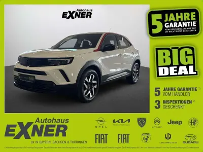 Gebraucht Opel Mokka GS Line 101 PS (74 kW) 2023 Jade weiß/spiegel schwarz lackiert SUV