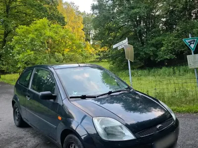 Gebraucht Ford Fiesta Ambiente 60 PS (44 kW) 2006 Schwarz Kleinwagen