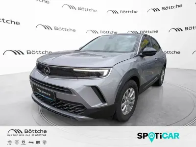 Gebraucht Opel Mokka-e Edition 100 kW (136 PS) 2022 Kontrast grau/quarz silber SUV