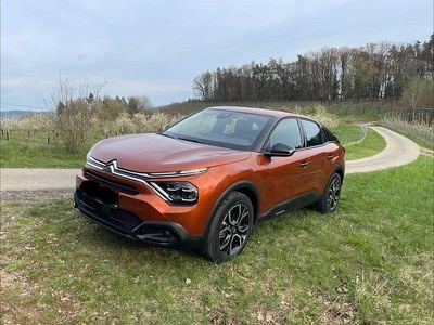 Second-hand Citroën e-C4 Feel 100 kW (136 CP) 2022 Portocaliu Berlinǎ