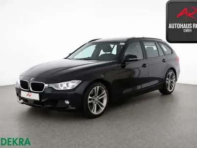 Gebraucht BMW 330 Comfort Edition 258 PS (189 kW) 2014 Black sapphire Kombi