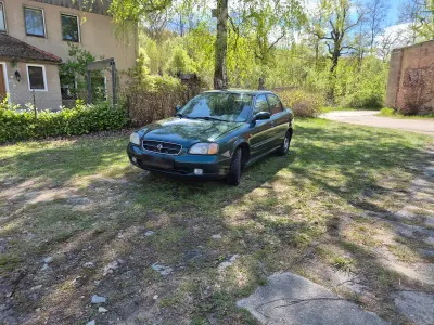 Brugt Suzuki Baleno GL 86 HK (63 kW) 2001 Grøn Sedan