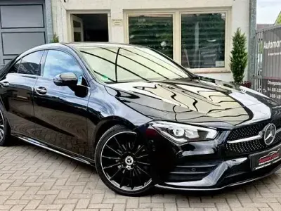 Gebraucht Mercedes CLA200 AMG line 150 PS (110 kW) 2023 Nachtschwarz (metallic) Coupé