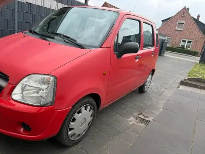 Używany Opel Agila 60 KM (44 kW) 2006 Czerwony Hatchback