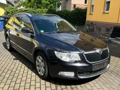 Używany Skoda Superb Elegance 140 KM (102 kW) 2010 Czarny Kombi