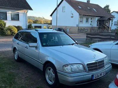 Brugt Mercedes C230 150 HK (110 kW) 1991 Sølv Stationcar