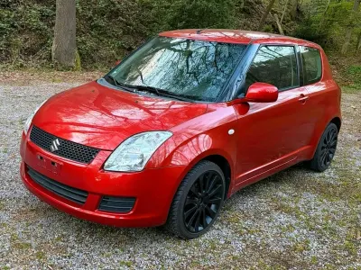 Gebraucht Suzuki Swift Club 94 PS (69 kW) 2010 Orange Kleinwagen