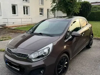 Gebraucht Kia Rio 90 PS (66 kW) 2012 Braun Limousine