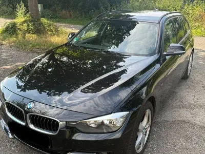 Gebraucht BMW 320 Sport Line 184 PS (135 kW) 2013 Schwarz Kombi