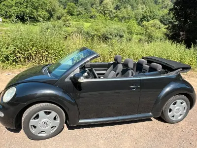 Gebraucht VW New Beetle 75 PS (55 kW) 2006 Schwarz Kleinwagen