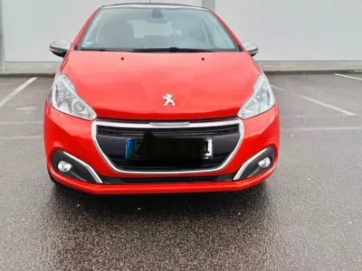 Gebraucht Peugeot 208 Active 82 PS (60 kW) 2017 Orange Kleinwagen