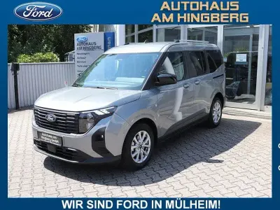Gebraucht Ford Tourneo Courier Titanium 125 PS (91 kW) 2024 Silber Van / Kleinbus