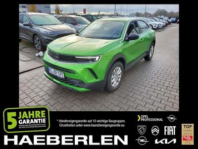 Gebraucht Opel Mokka-e Edition 100 kW (136 PS) 2022 Matcha green/ikone gruen (metallic) SUV