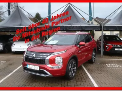 Gebraucht Mitsubishi Outlander P-HEV Top 306 PS (225 kW) 2026 Rot SUV