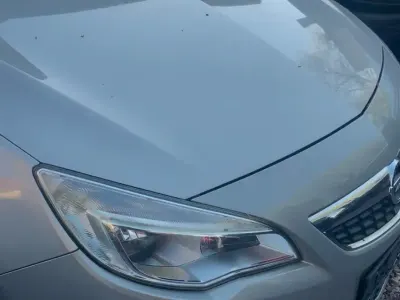 Używany Opel Astra Eco 74 KM (54 kW) 2009 Srebrny Sedan/Limuzyna