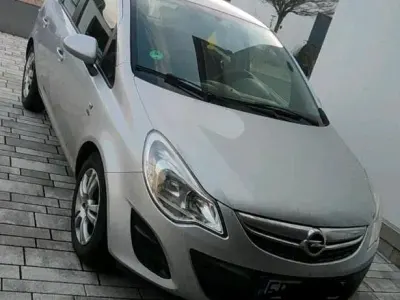 Gebraucht Opel Corsa Active 95 PS (69 kW) 2013 Silber Kleinwagen