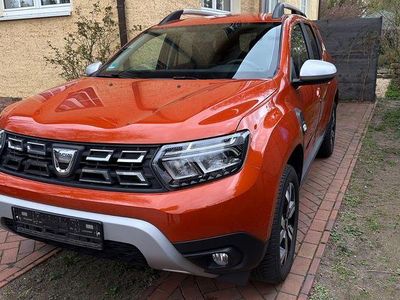 Second-hand Dacia Duster Prestige 150 CP (110 kW) 2022 Portocaliu SUV
