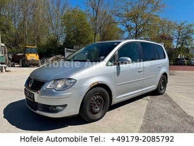 Second-hand VW Touran United 140 CP (102 kW) 2009 Argintiu Monovolum