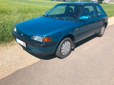Usata Mazda 323 88 CV (64 kW) 1992 Blu