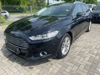 Gebraucht Ford Mondeo Titanium 160 PS (117 kW) 2015 Pantherschwarz metallic Kombi