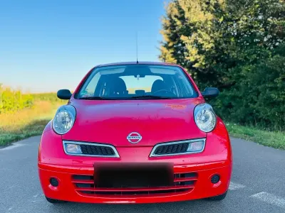 Gebraucht Nissan Micra 65 PS (47 kW) 2009 Rot Kleinwagen