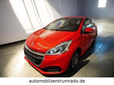 Gebraucht Peugeot 208 Active 82 PS (60 kW) 2015 Orange Kleinwagen
