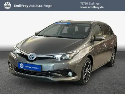 Gebraucht Toyota Auris Hybrid Basis 136 PS (100 kW) 2017 Platinum bronze metallic Kombi