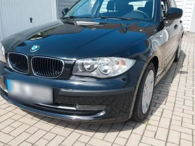 Gebraucht BMW 116 122 PS (89 kW) 2010 Schwarz Kleinwagen