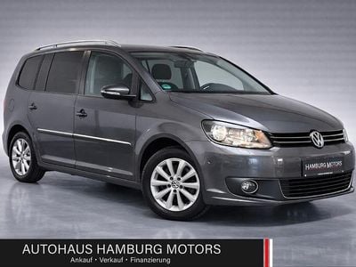 Second-hand VW Touran Highline 140 CP (102 kW) 2014 Gri Monovolum