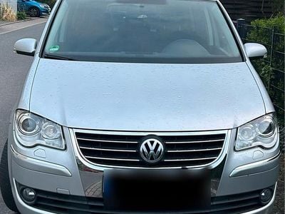 Second-hand VW Touran Pro 109 CP (80 kW) 2007 Argintiu Monovolum