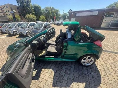 Gebraucht Opel Tigra Enjoy 90 PS (66 kW) 2004 Robogruen mi2 Cabrio
