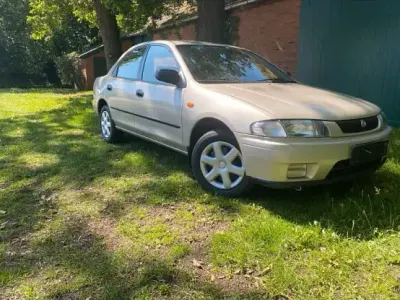 Gebraucht Mazda 323F 88 PS (64 kW) 1997 Gold Limousine