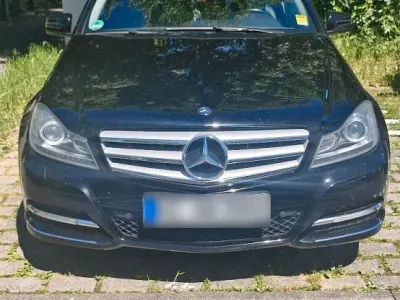 Używany Mercedes C250 204 KM (150 kW) 2012 Czarny Kombi