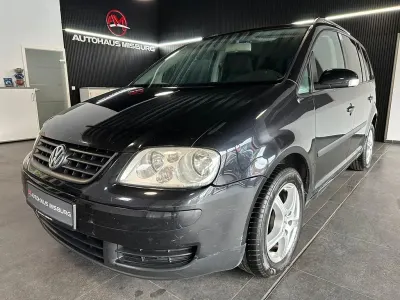 Używany VW Touran 102 KM (75 kW) 2003 Czarny Minivan