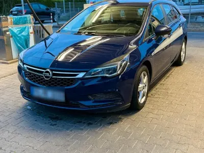 Gebraucht Opel Astra 110 PS (80 kW) 2016 Blau Kombi
