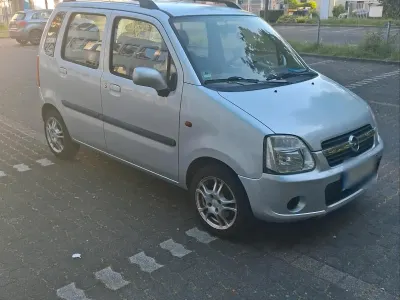 Używany Opel Agila 67 KM (49 kW) 2005 Srebrny Minivan
