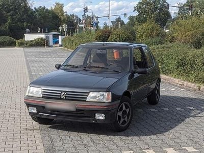 Usado Peugeot 205 GTi 75 HP (55 kW) 1991 Cinzento Sedan