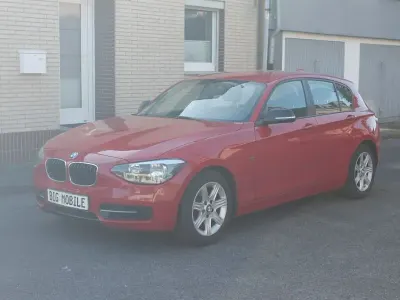 Second-hand BMW 116 Sport Line 136 CP (100 kW) 2011 Roșu Hatchback