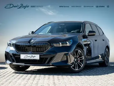 Gebraucht BMW 520 M Sport 197 PS (144 kW) 2025 Sophistograu brillanteffekt metallic Kombi