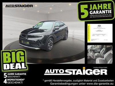 Gebraucht Opel Mokka-e Elegance 100 kW (136 PS) 2023 Lackierung schwarz perla nera/ SUV