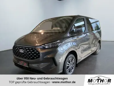 Gebraucht Ford Tourneo Custom Titanium 170 PS (125 kW) 2024 Magneticgrau (metallic) Van