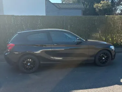 Second-hand BMW 116 136 CP (100 kW) 2013 Negru Hatchback