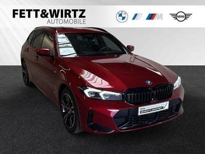 Gebraucht BMW 330e M Sport 292 PS (214 kW) 2024 Fire red metallic Kombi